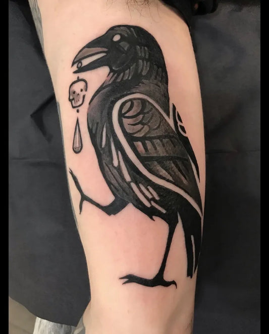 Medium Gothic Raven with Skull and Drop Tattoo on Men Arm by @kelpiebat