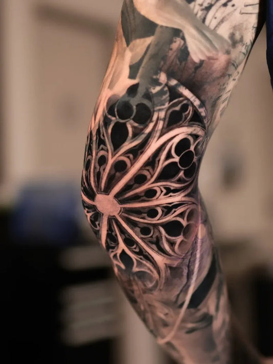 Medium Gothic RoseWindow Tattoo on Women Knee by @tattooist_reset