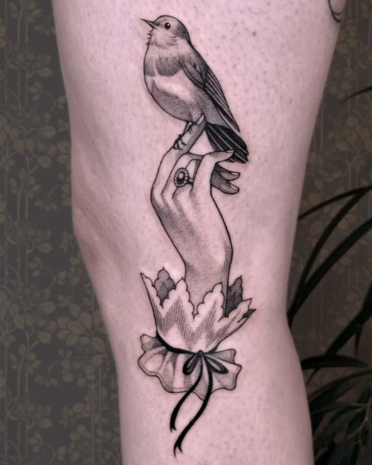 Medium Illustrative Bird Hand Tattoo on Women Thigh by @jiangbrulant