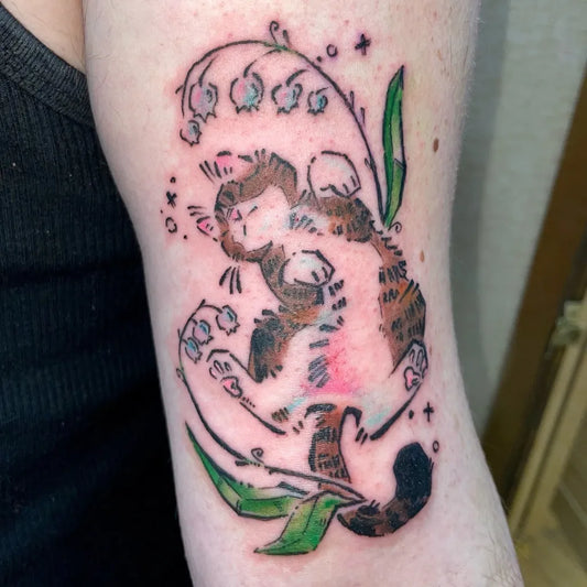 Medium Illustrative Cat with Lily of the Valley Tattoo on Women Arm by @eenchwyrm