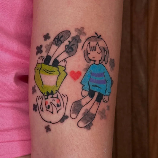 Medium Illustrative Chara and Asriel Undertale Tattoo on Women Arm by @fairypulp