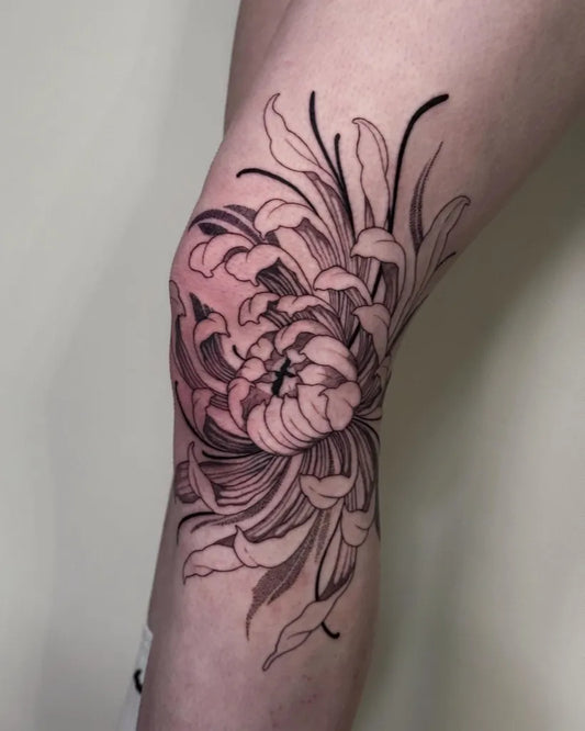 Medium Illustrative Chrysanthemum in Black and Grey Tattoo on Women Knee by @lisasahmel