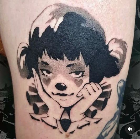 Medium Illustrative Clown Girl Tattoo on Women Arm by @whtraventattoo