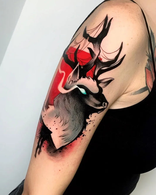 Medium Illustrative Deer with Antlers and Splatter Tattoo on Women Upper Arm by @nefatattoo