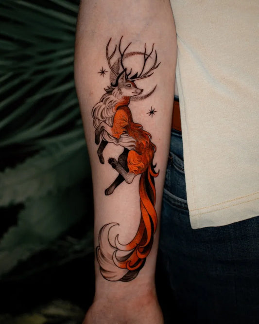 Medium Illustrative Fox with Antlers Tattoo on Women Arm by @monique.munoz.art