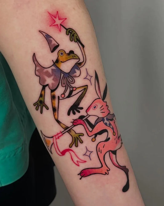 Medium Illustrative Frog and Rabbit Magicians Tattoo on Women Arm by @shlorp.tats