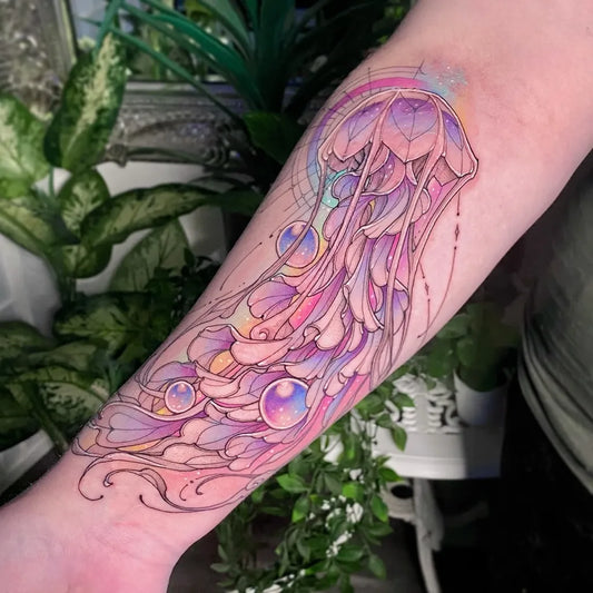 Medium Illustrative Jellyfish Bubbles Tattoo on Women Arm by @lucassouzatattoo