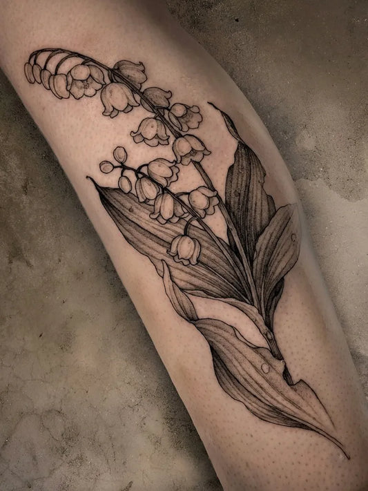 Medium Illustrative Lily of the Valley Tattoo on Women Leg by @aspectgraphite