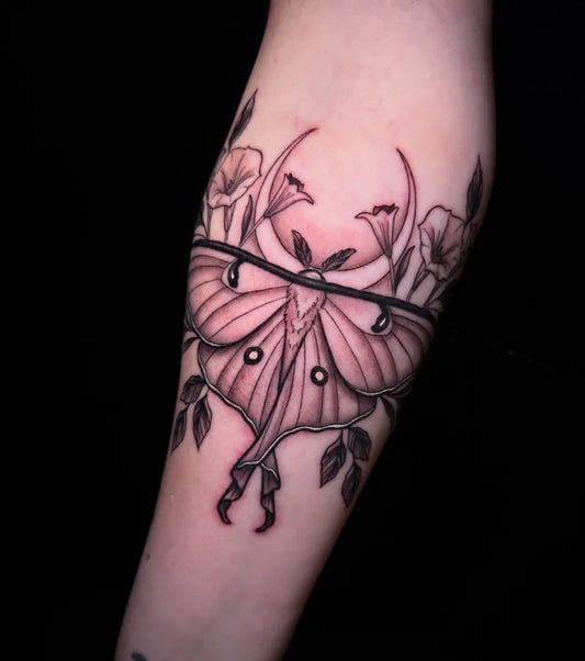 Medium Illustrative Luna Moth and Moon Tattoo on Women Arm by @deefloriantattoos