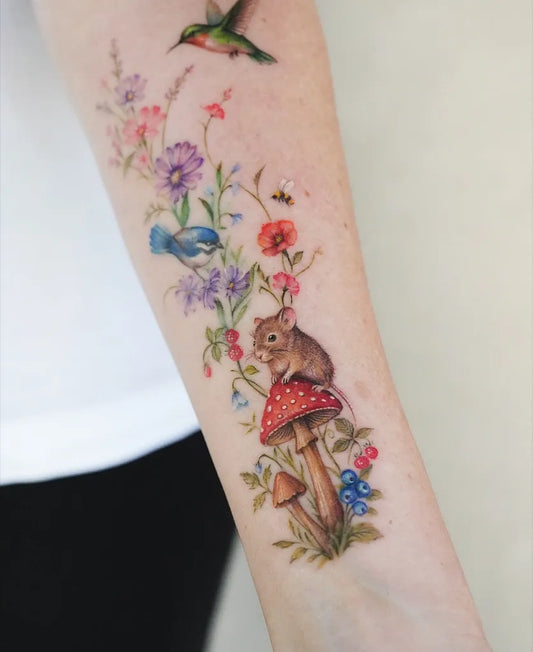 Medium Illustrative Mouse Hummingbird Mushroom on Women Arm Tattoo by @tattoo.by_jinnie