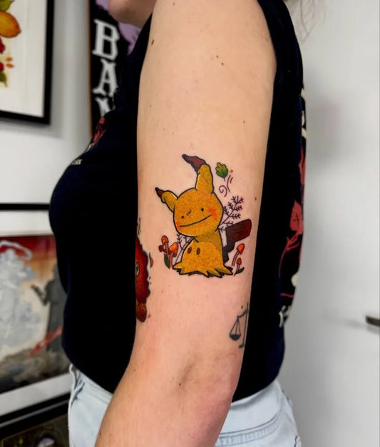 Medium Illustrative Pikachu with Flowers Tattoo on Women Arm by @foxx.teeth_