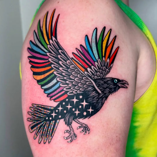 Medium Illustrative Rainbow Crow Tattoo on Women Shoulder by @derykwebb
