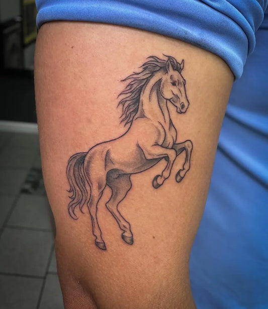 Medium Illustrative Rearing Horse Tattoo on Men Arm by @tickle_tats