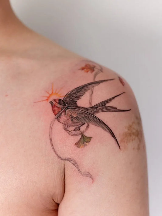 Medium Illustrative Swallow with Sun and Vines Tattoo on Men Shoulder by @mumi_ink