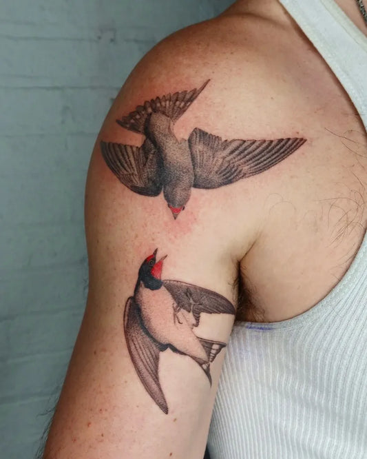 Medium Illustrative Two Flying Swallows Tattoo on Men Shoulder by @az.jpg