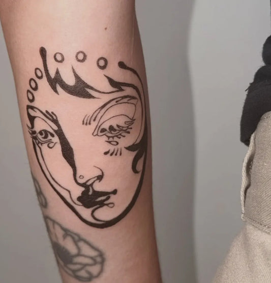 Medium Illustrative Woman Face Tattoo on Women Arm by @liizoni