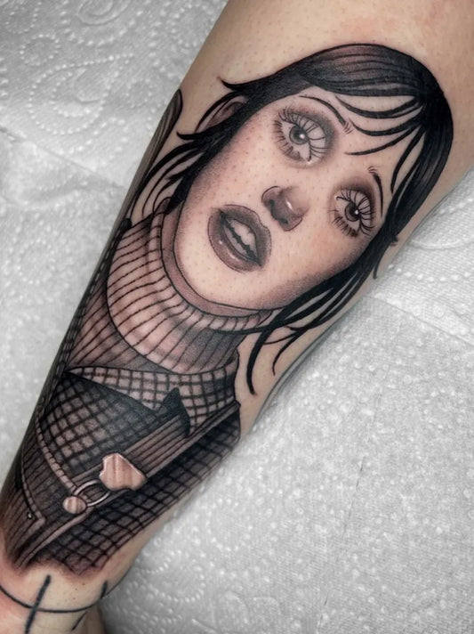 Medium Illustrative Woman Portrait Tattoo on Women Arm by @geniekittietattoo