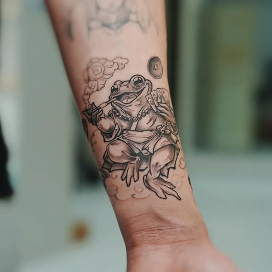 Medium Irezumi Frog with Clouds Tattoo on Women Arm by @colby.tattoo