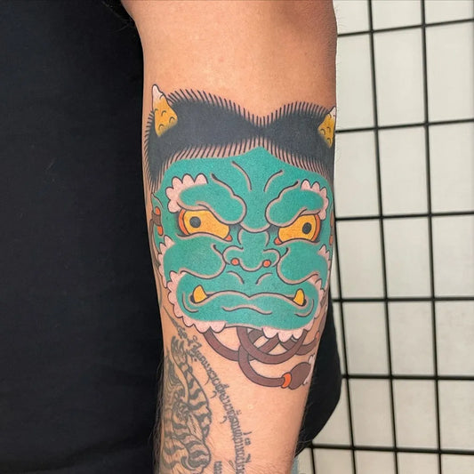 Medium Irezumi Oni Mask on Men Arm Tattoo by @momoyuhi_tattoo