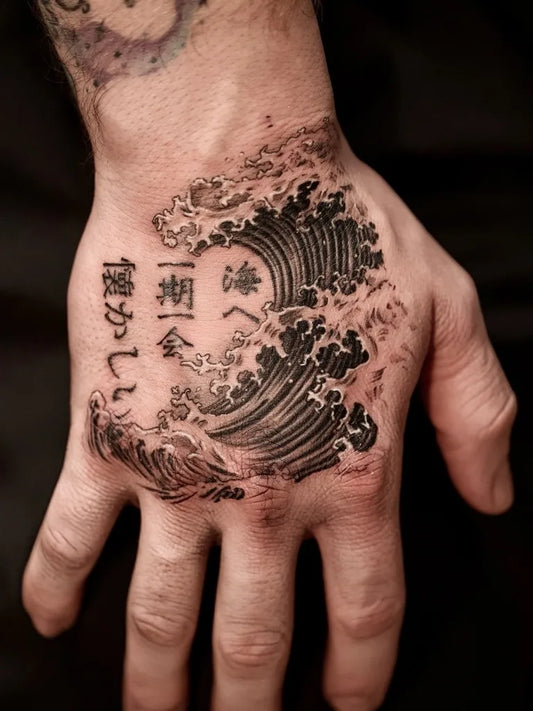 Medium Irezumi Wave and Kanji Tattoo on Men Hand by @d.w._modoink