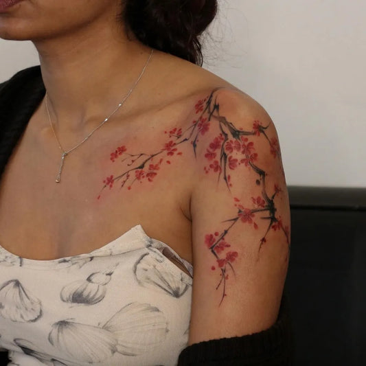 Medium Japanese Cherry Blossom on Women Shoulder Tattoo by @karmon.tat