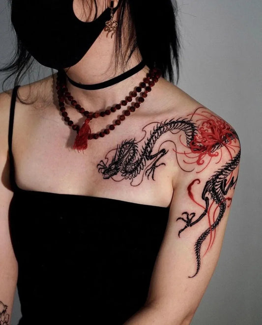 Medium Japanese Dragon and Cosmos Tattoo on Women Shoulder by @seoulinktattoo