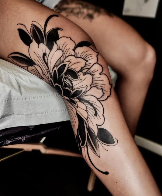 Medium Japanese Flower Tattoo on Women Knee by @sarahrose_tattoo
