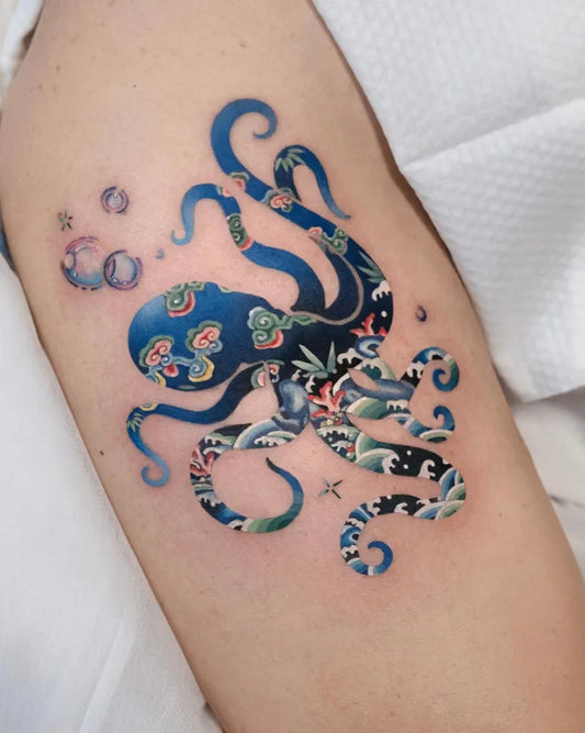 Medium Japanese Octopus Tattoo on Women Arm by @inktattoo_studio_