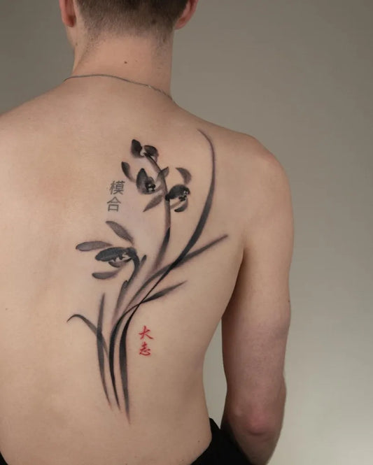 Medium Japanese Orchid and Chinese Characters Tattoo on Men Back by @moko.cjtattoo