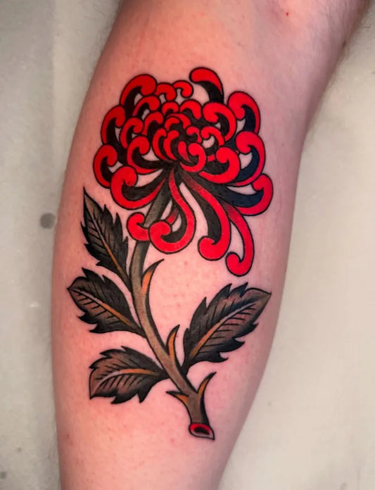 Medium Japanese Red Chrysanthemum with Leaves Tattoo on Women Thigh by @alinabenson.tattoo