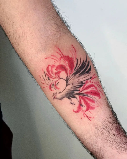 Medium Japanese Spider Lily Red and Bird Tattoo on Men Arm by @sylvia.ink.journal