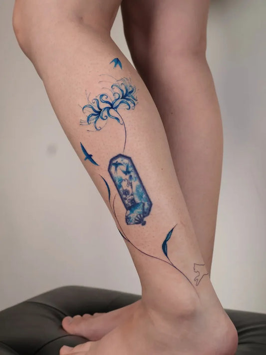 Medium Japanese Spider Lily blue Birds Vase Tattoo on Women Leg by @caodynastydesigns