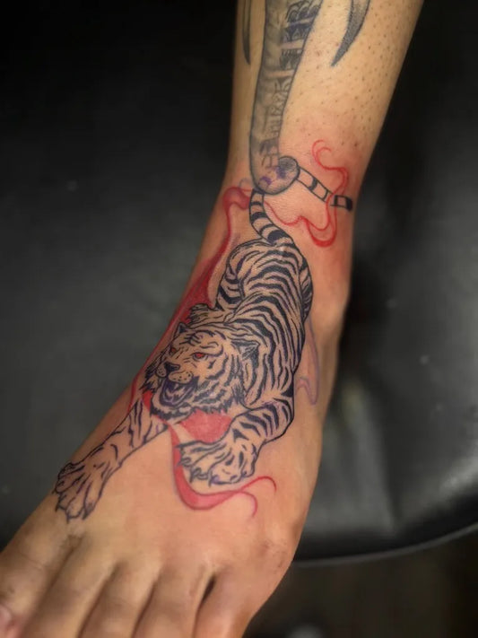 Medium Japanese Tiger Tattoo on Women Foot by @signedbyq_