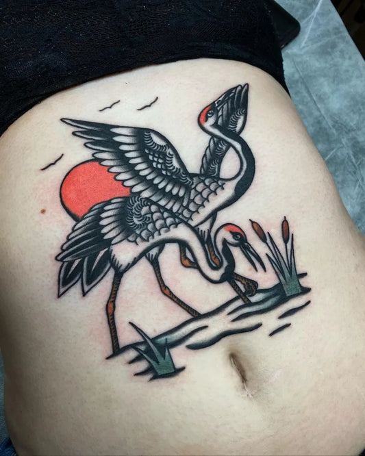 Medium Japanese Two Cranes and Red Sun Tattoo on Women Stomach by @alxgracia