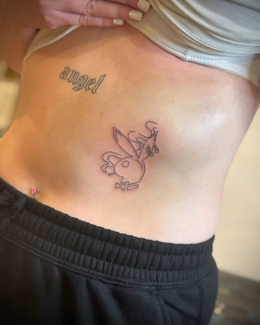 Medium Linework Angel Bunny on Women Side Tattoo by @inked_byjaz_