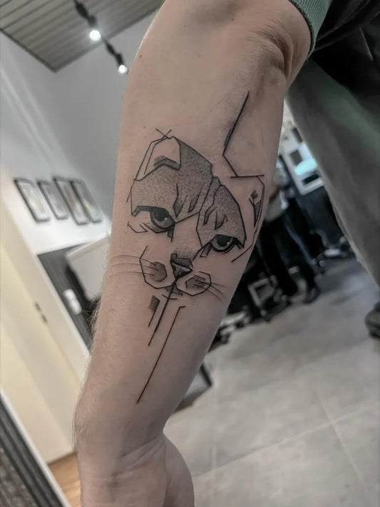Medium Linework Cat Face Animal Tattoo on Men Arm by @zaba.tattoo