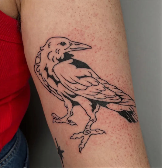 Medium Linework Crow Tattoo on Women Arm by @twofacedserpent