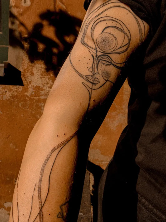 Medium Linework Face Tattoo on Men Arm by @little_lazo.tattoo