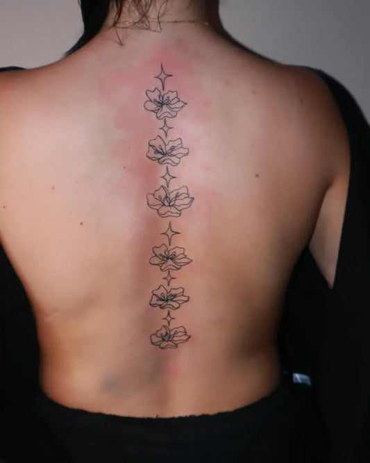 Medium Linework Floral Vine on Women Back Tattoo by @poohdavincii