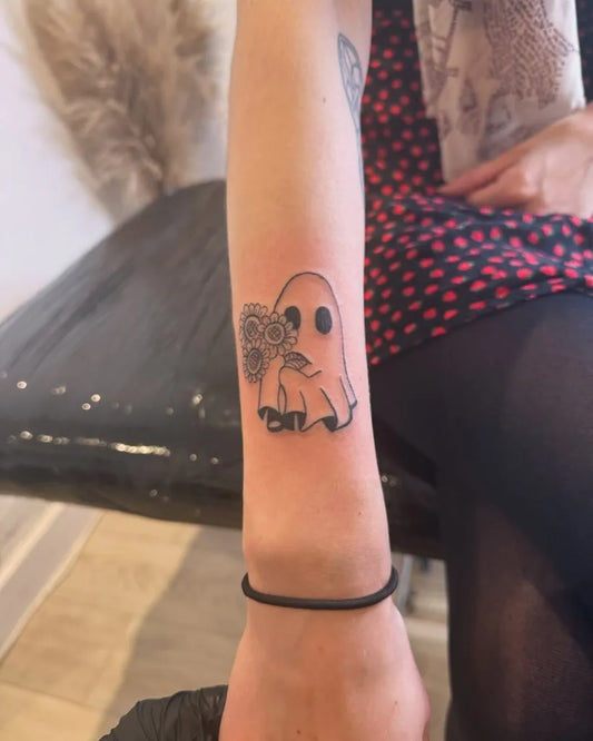 Medium Linework Ghost with Rose on Women Arm Tattoo by @inked_byjaz_