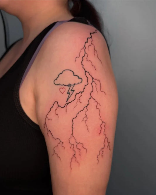 Medium Linework Lightning Cloud Tattoo on Women Shoulder by @este_tattoo