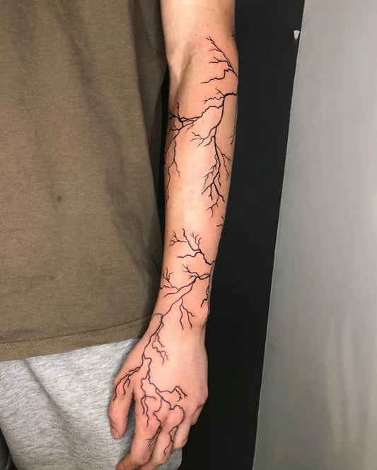 Medium Linework Lightning Tattoo on Men Arm by @allexandra.cretu