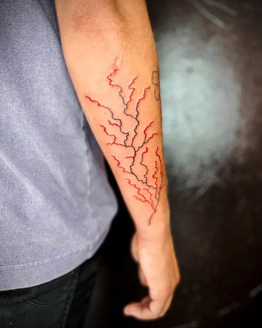 Medium Linework Lightning Tattoo on Men Arm by @laure_anartink