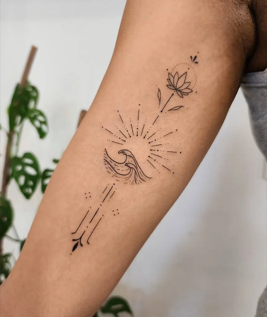 Medium Linework Lotus Flower Wave Sun on Women Arm Tattoo by @daniel.nabil_ink