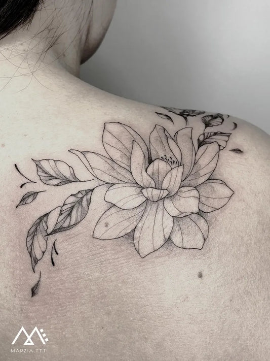 Medium Linework Lotus Flower with Leaves on Women Shoulder Tattoo by @marzia.ttt