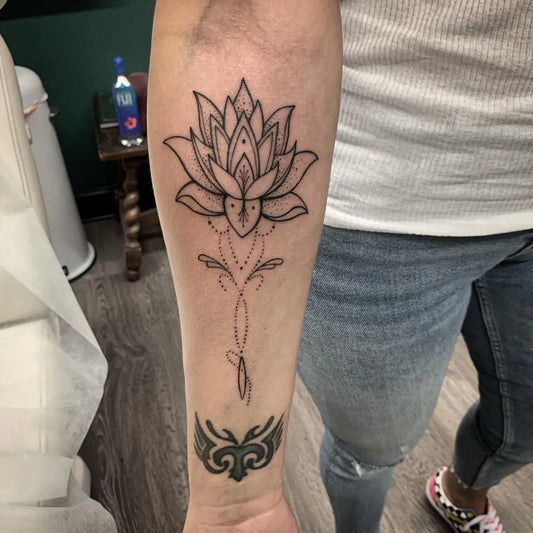 Medium Linework Lotus Flower with Mandala on Women Arm Tattoo by @clifffranksart
