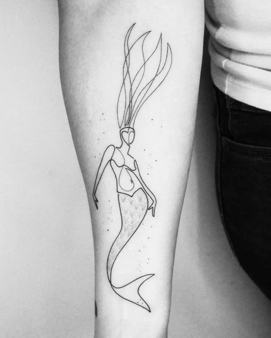 Medium Linework Mermaid Tattoo on Women Arm by @moganji