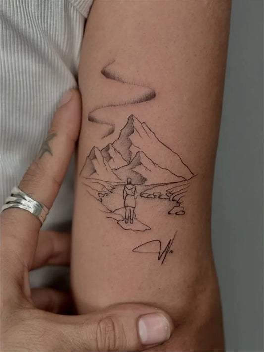 Medium Linework Mountain and Hiker Tattoo on Men Arm by @_geracci_