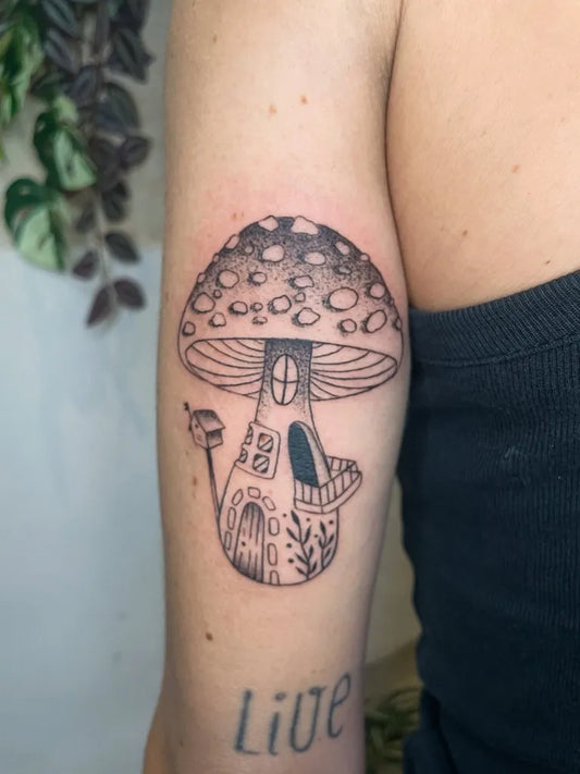 Medium Linework Mushroom House on Women Arm Tattoo by @boum_tchikboum