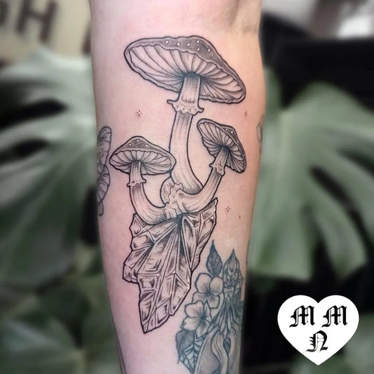 Medium Linework Mushrooms Butterfly Leaves on Women Arm Tattoo by @foreverboundtattoo